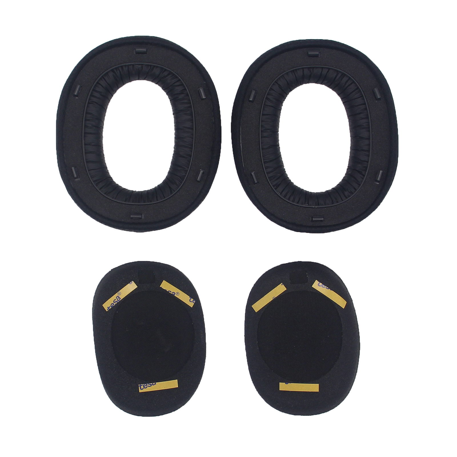 Oorkussens voor hoofdtelefoons. Twee ovale kussens en twee kleinere met lijm.