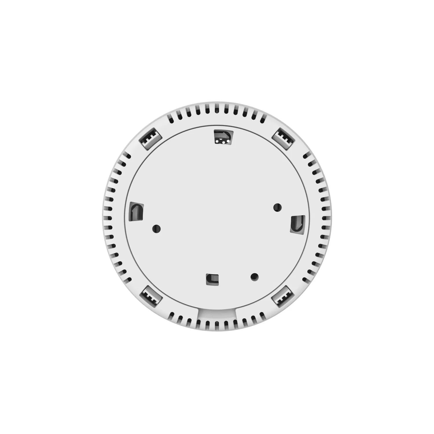 Widok od spodu białego czujnika tlenku węgla, pokazujący otwory wentylacyjne i punkty montażowe.