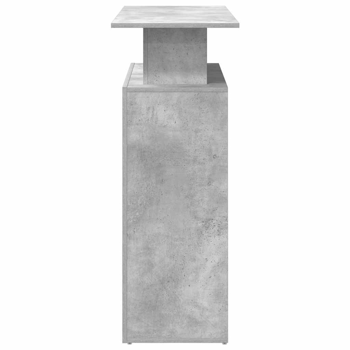 Ein hoher Schrank aus grauem Beton. Er hat ein kleineres Oberteil.