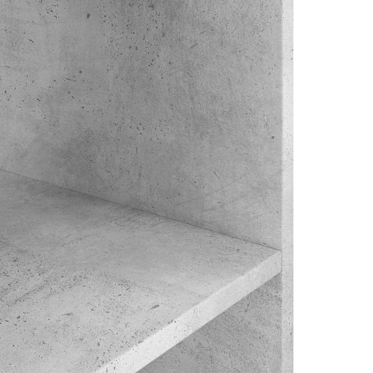 Nahaufnahme eines Betonregals. Die Textur ist rau.