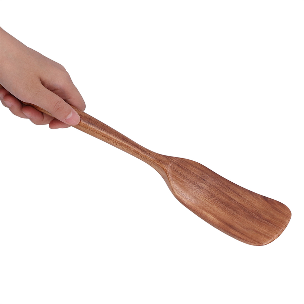Holzspatel von einer Hand gehalten, nach rechts geneigt. Helle Holzfarbe.