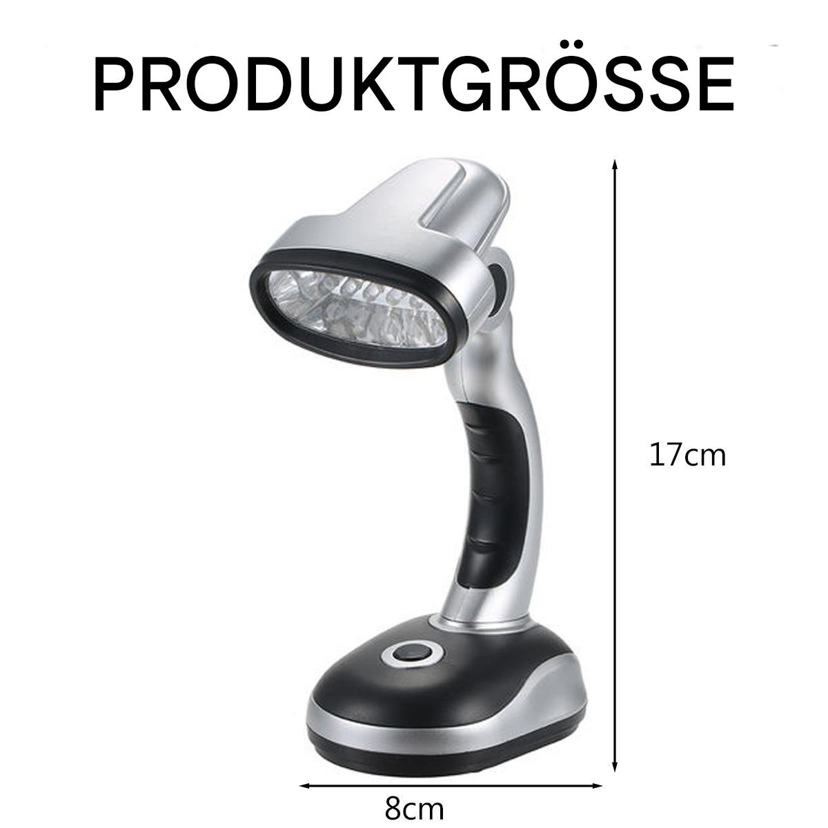 Eine silberne und schwarze Schreibtischlampe. Die Lampe hat einen runden Sockel, einen gebogenen Hals und einen Scheinwerferkopf.