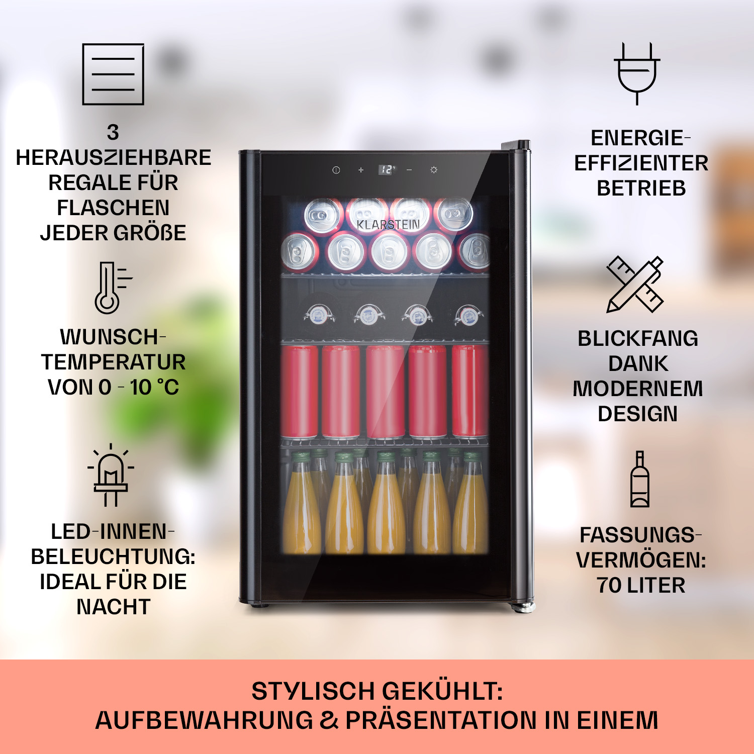 Un mini frigo nero con lattine rosse e bottiglie di succo d'arancia.