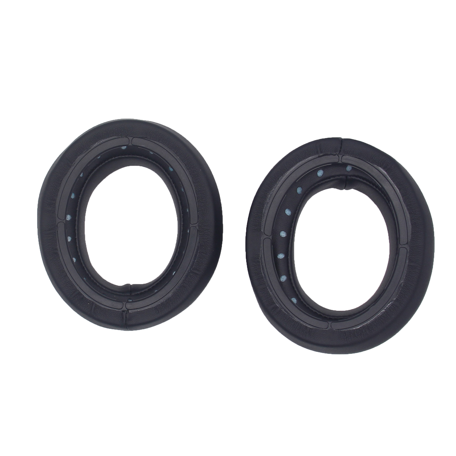 Dwie czarne poduszki do słuchawek na białym tle. Są okrągłe z otworem.