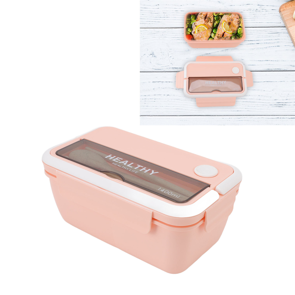 Rosa Lunchbox mit Fächern. Draufsicht auf Essen darin. Deckel offen, Utensil sichtbar. Weißer Holzuntergrund.