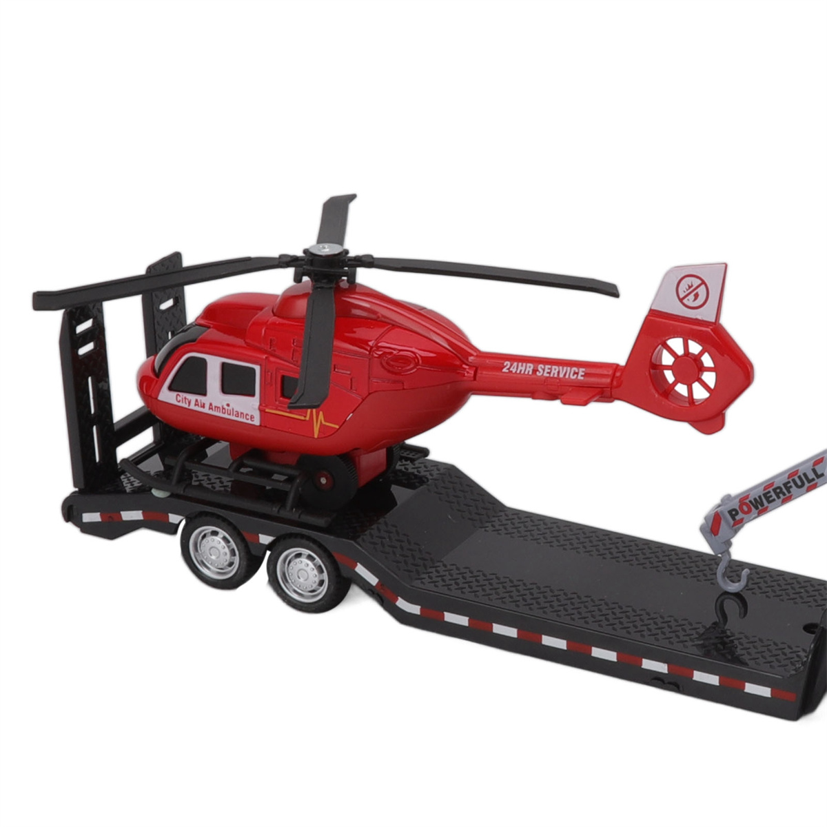 Ein roter Spielzeug-Hubschrauber auf einem schwarzen Anhänger. Der Anhänger hat Räder und einen Kran.