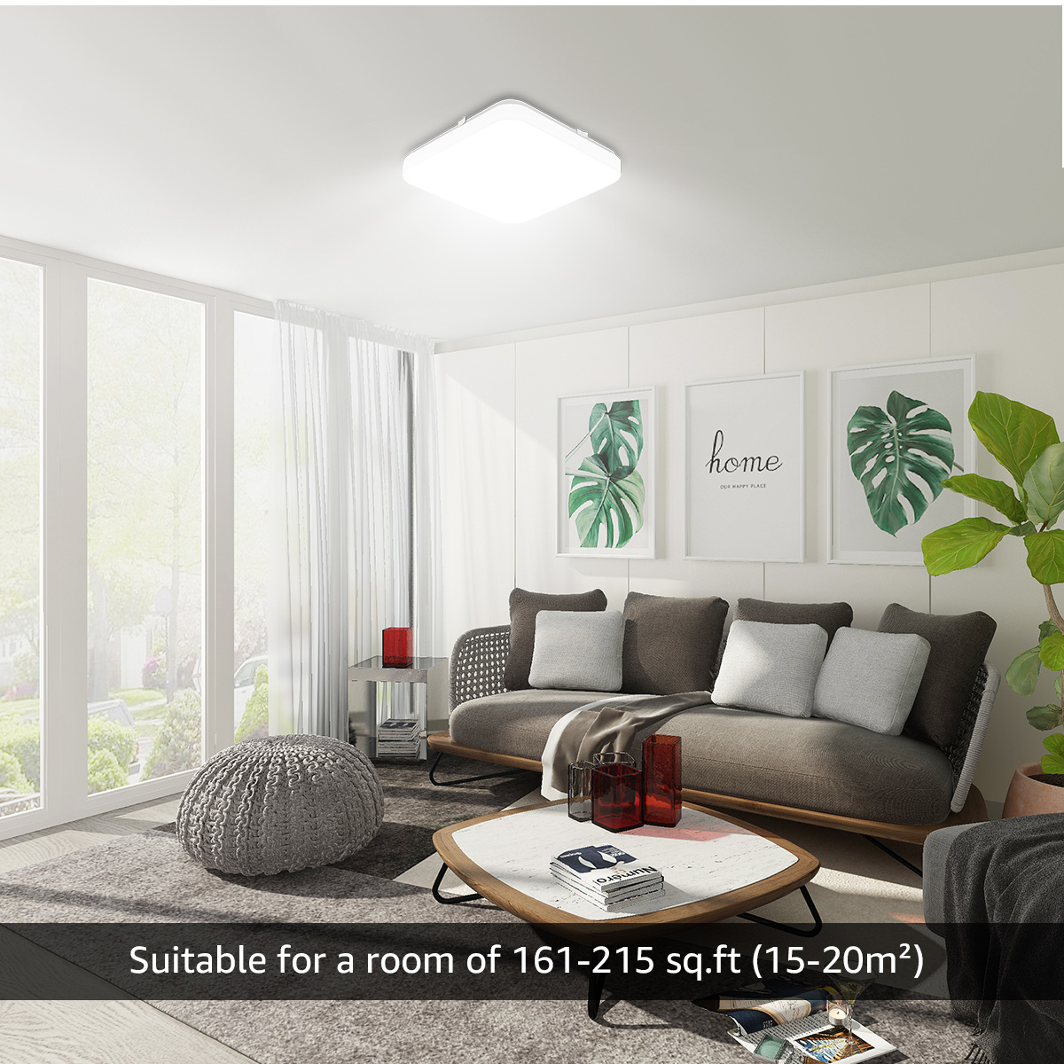 Wohnzimmer mit Sofa, Couchtisch und Kunstwerken. Geeignet für 15-20 m².