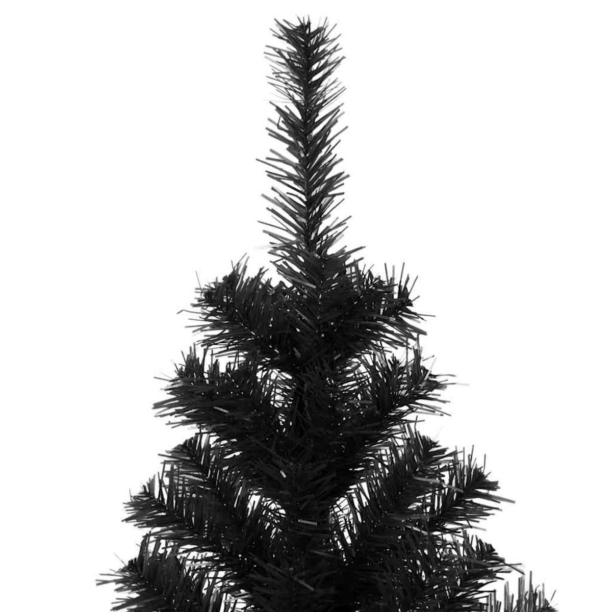 Nahaufnahme eines schwarzen Weihnachtsbaums. Die Nadeln und Äste sind scharf auf Weiß fokussiert.