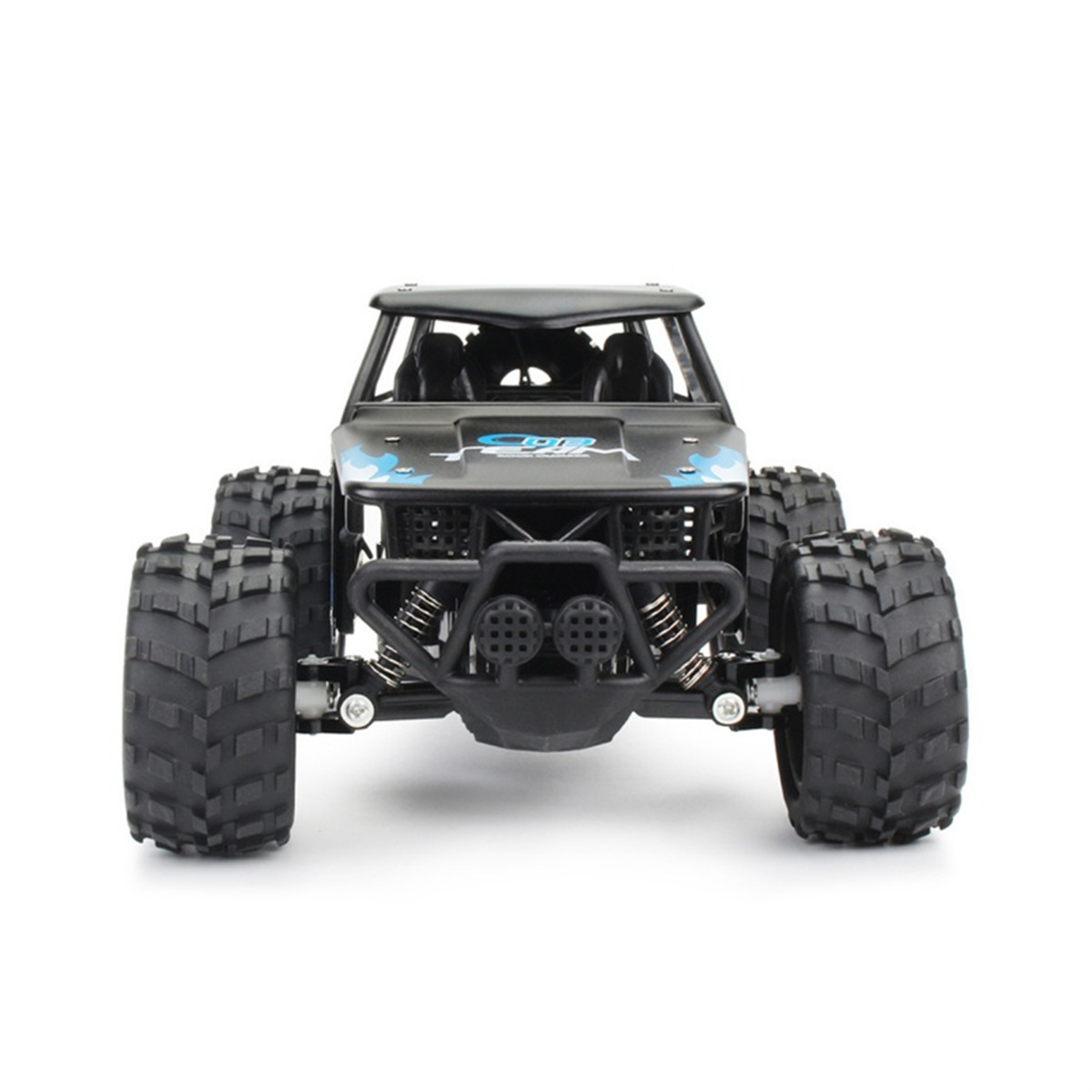 Ein schwarzer Spielzeug-Monstertruck mit großen Reifen auf weißem Hintergrund.