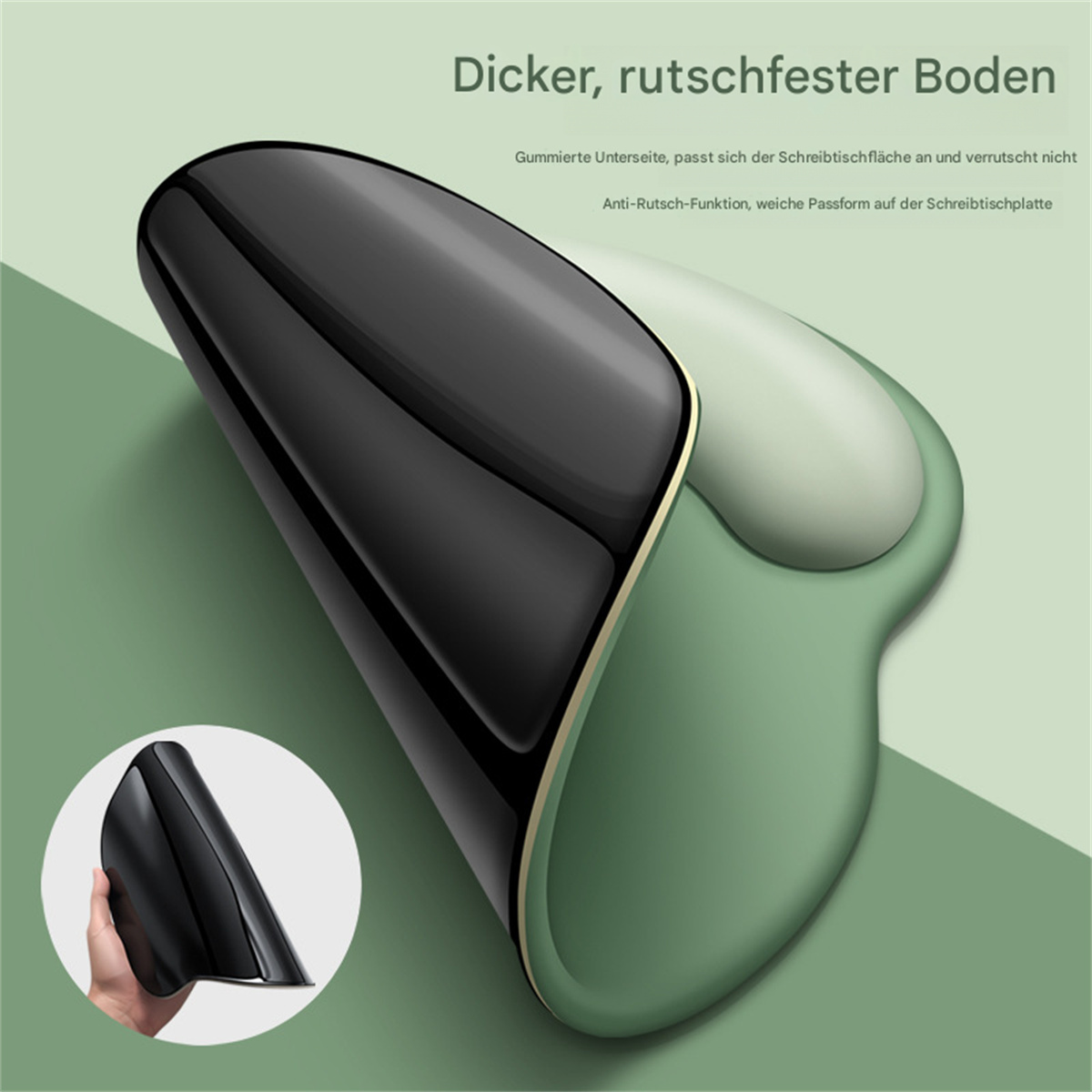 Ein schwarzes und grünes Mauspad, Nahaufnahme.