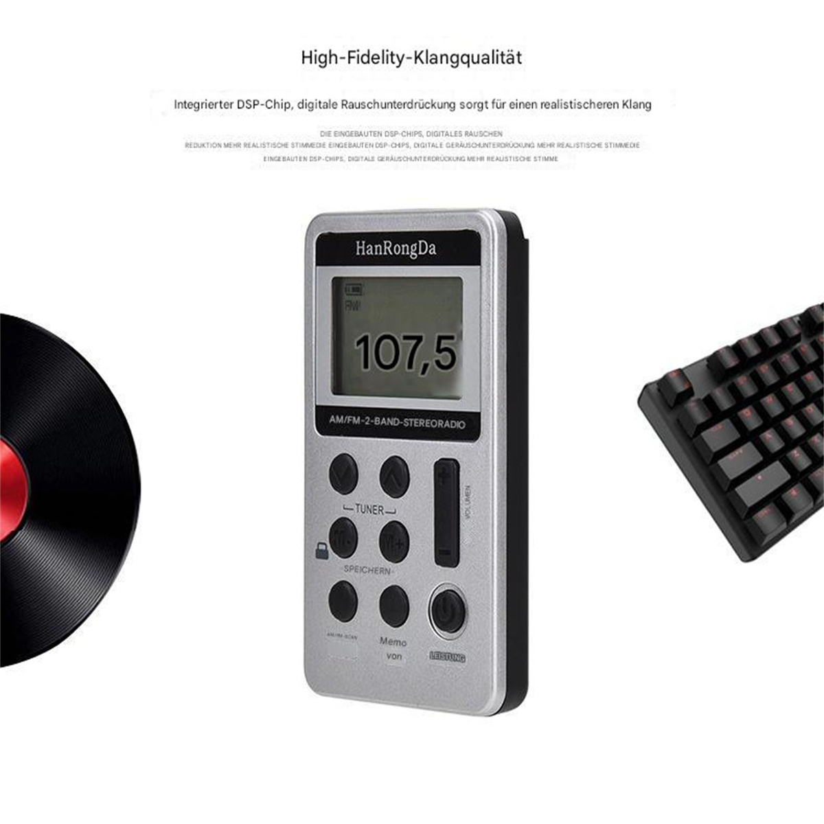 Ein silbernes Radio mit schwarzer Tastatur. Text lautet 'AM/FM-2-BAND-STEREORADIO' und '107,5'.