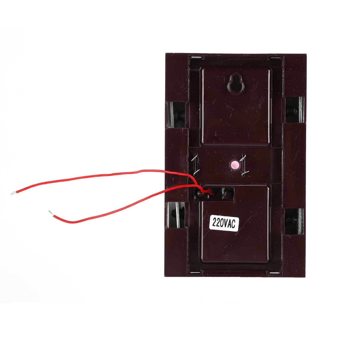 Rückseite eines braunen Elektrogeräts mit roten Drähten, Aufkleber: 220VAC.