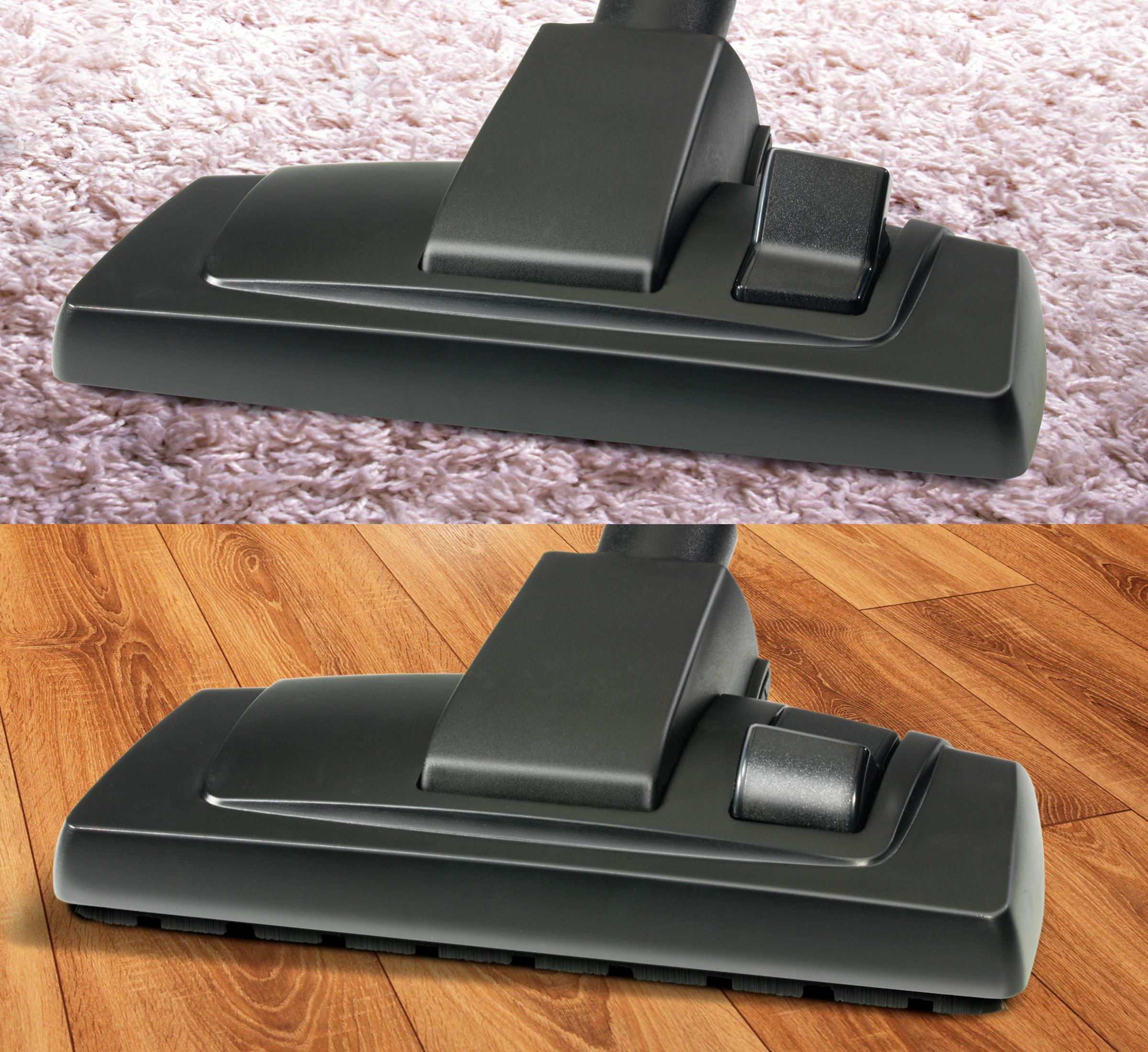 Głowica odkurzacza na dywanie i drewnianej podłodze. Czarny plastik.