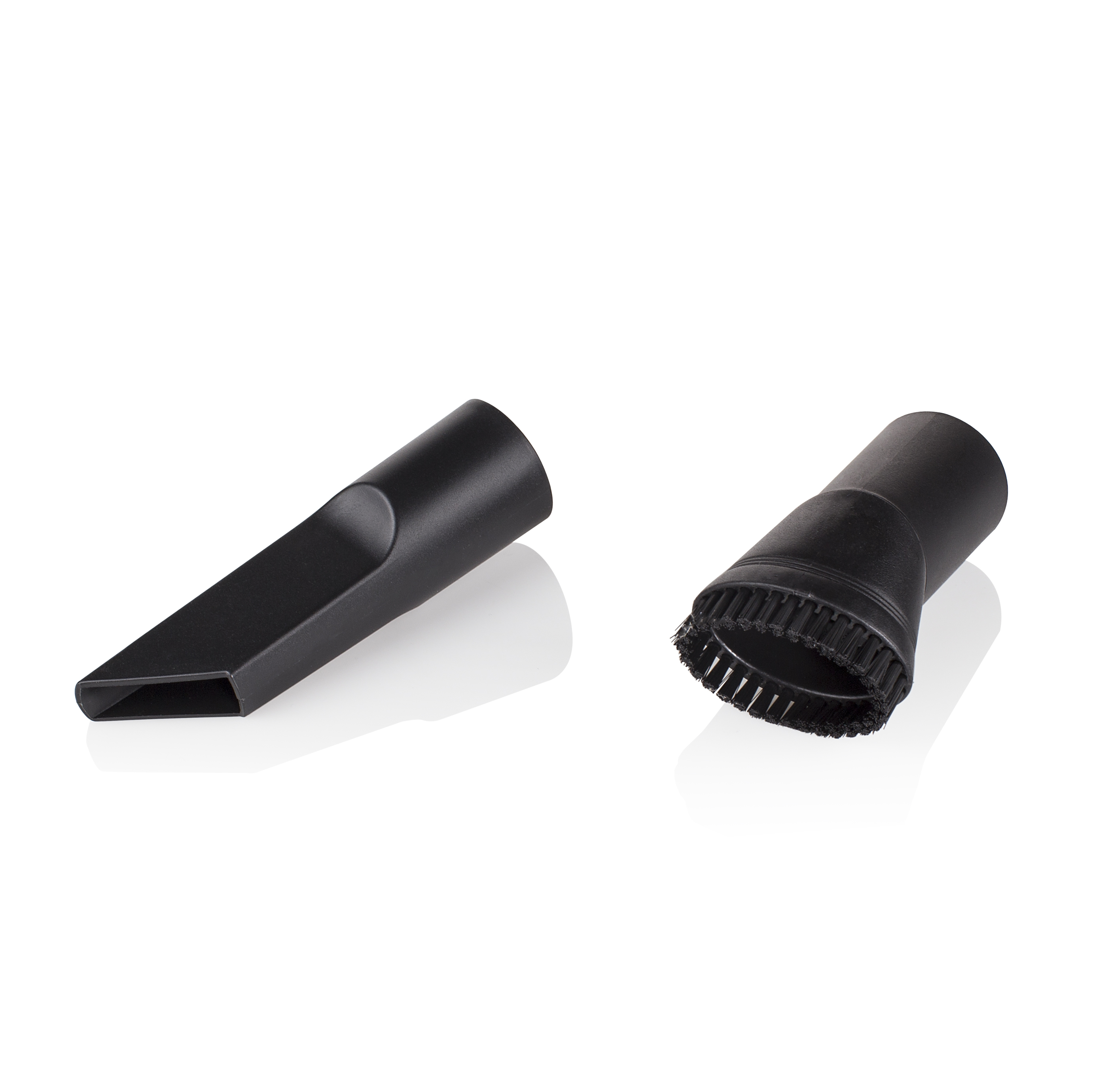 Dwa czarne końcówki do odkurzacza: jedna to dysza, a druga ma włosie.
