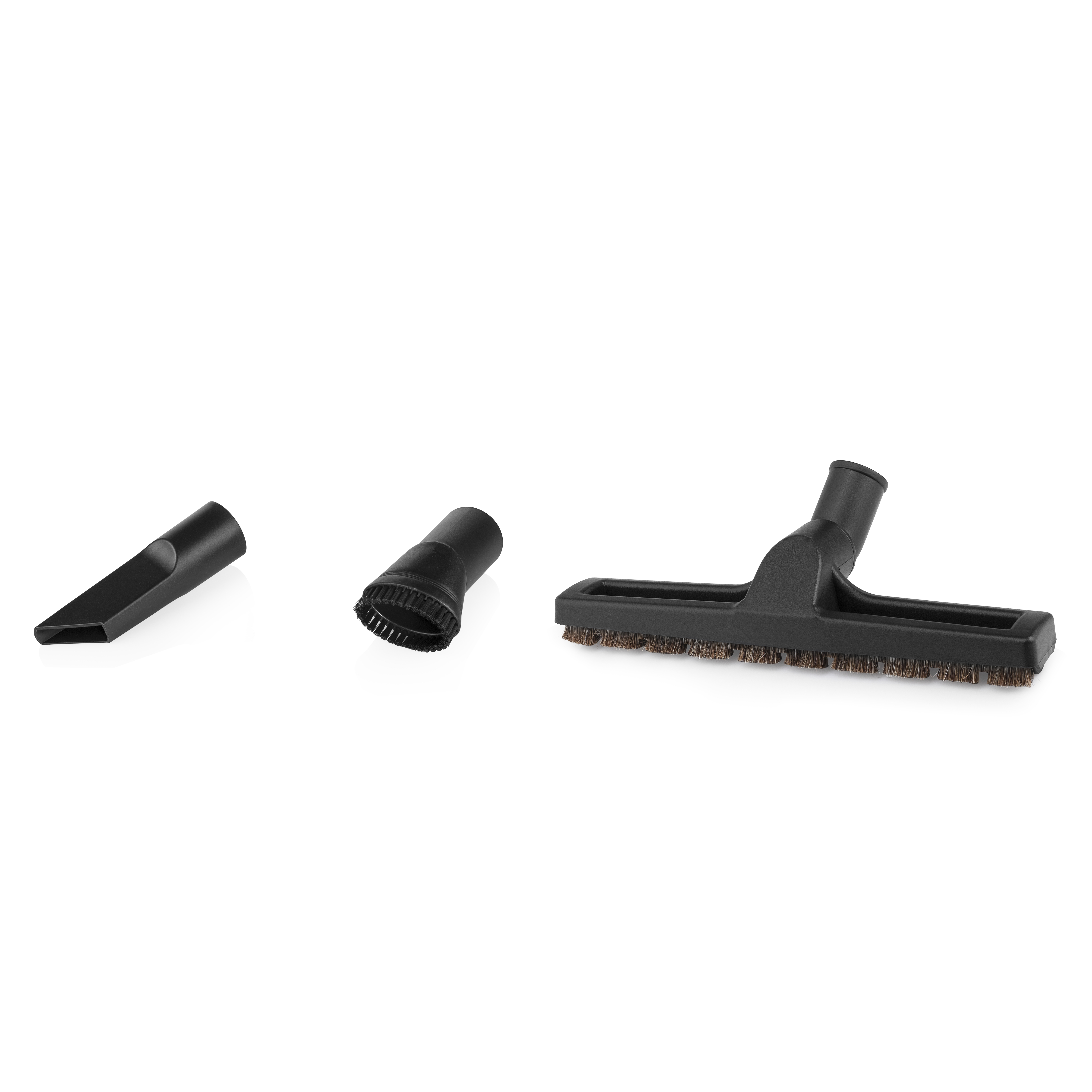 Tres accesorios negros de aspiradora: boquilla, boquilla con cepillo y cabezal ancho con cepillo.