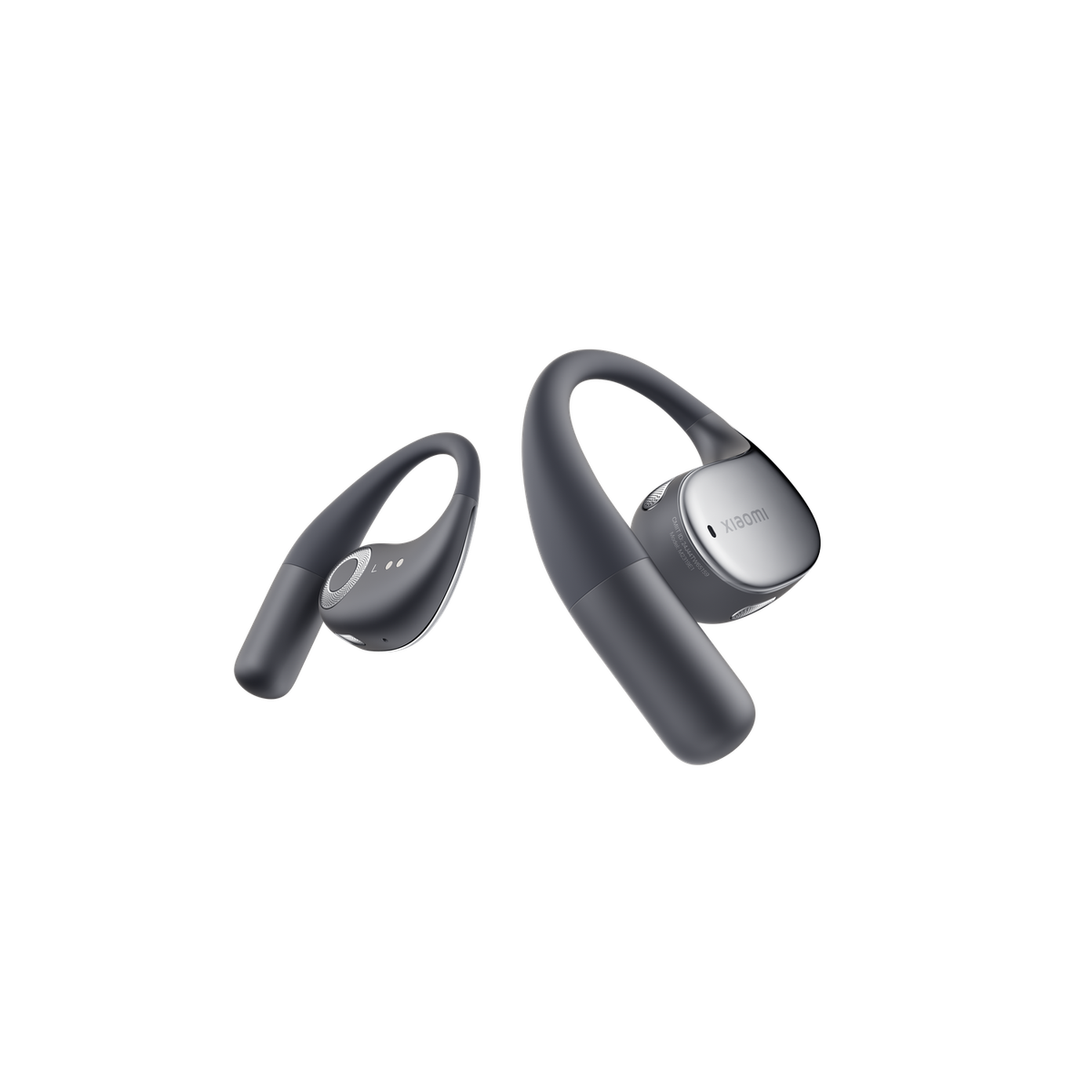 Dwa szare bezprzewodowe słuchawki sportowe na czarnym tle.