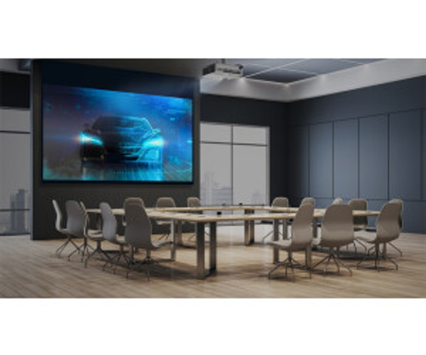 Sala konferencyjna z dużym ekranem wyświetlającym samochód.