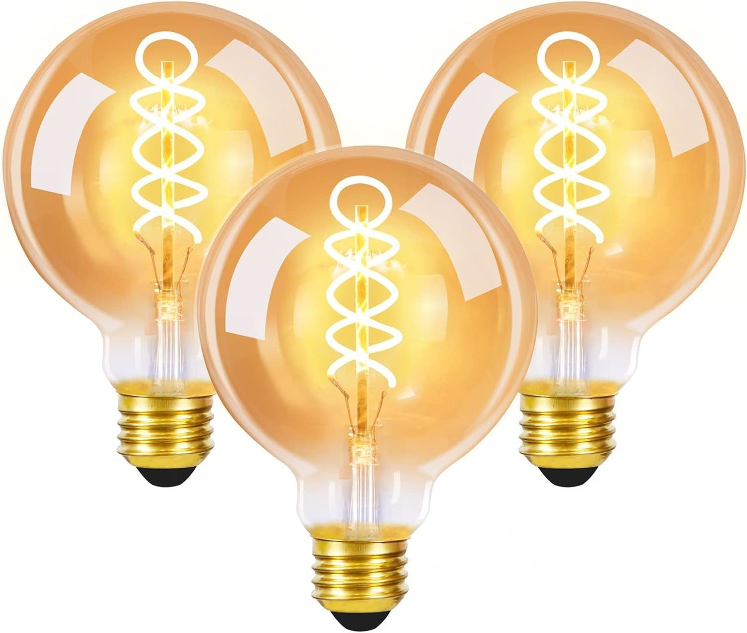 Drei Glühbirnen mit einem Spiraldesign im Inneren. Die Birnen haben eine goldene Farbe.
