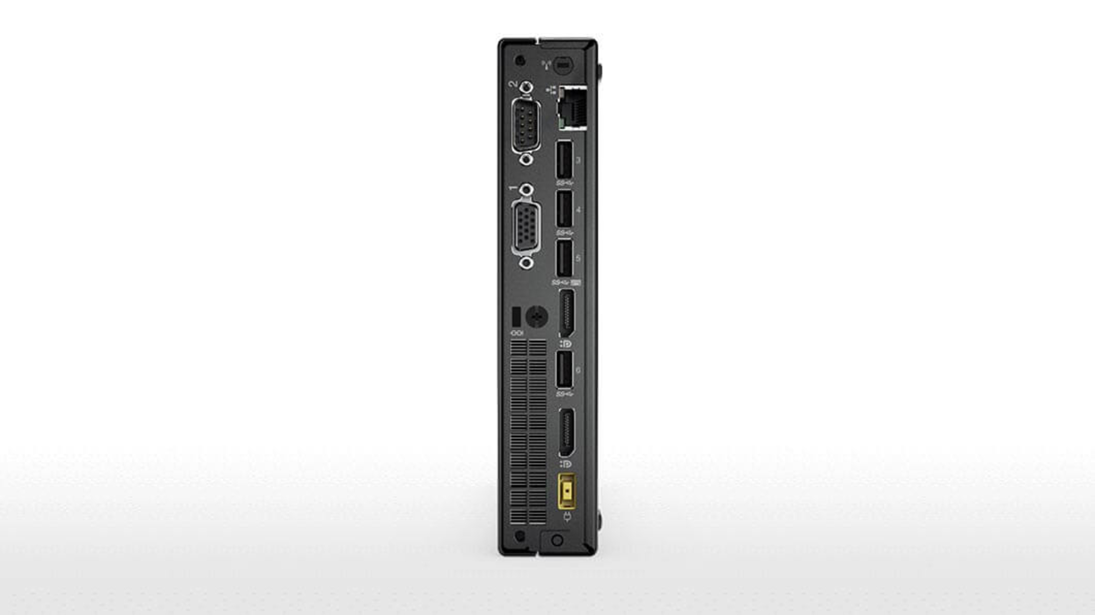 Die Seitenansicht eines schwarzen Computers mit mehreren Anschlüssen. Weißer Hintergrund.