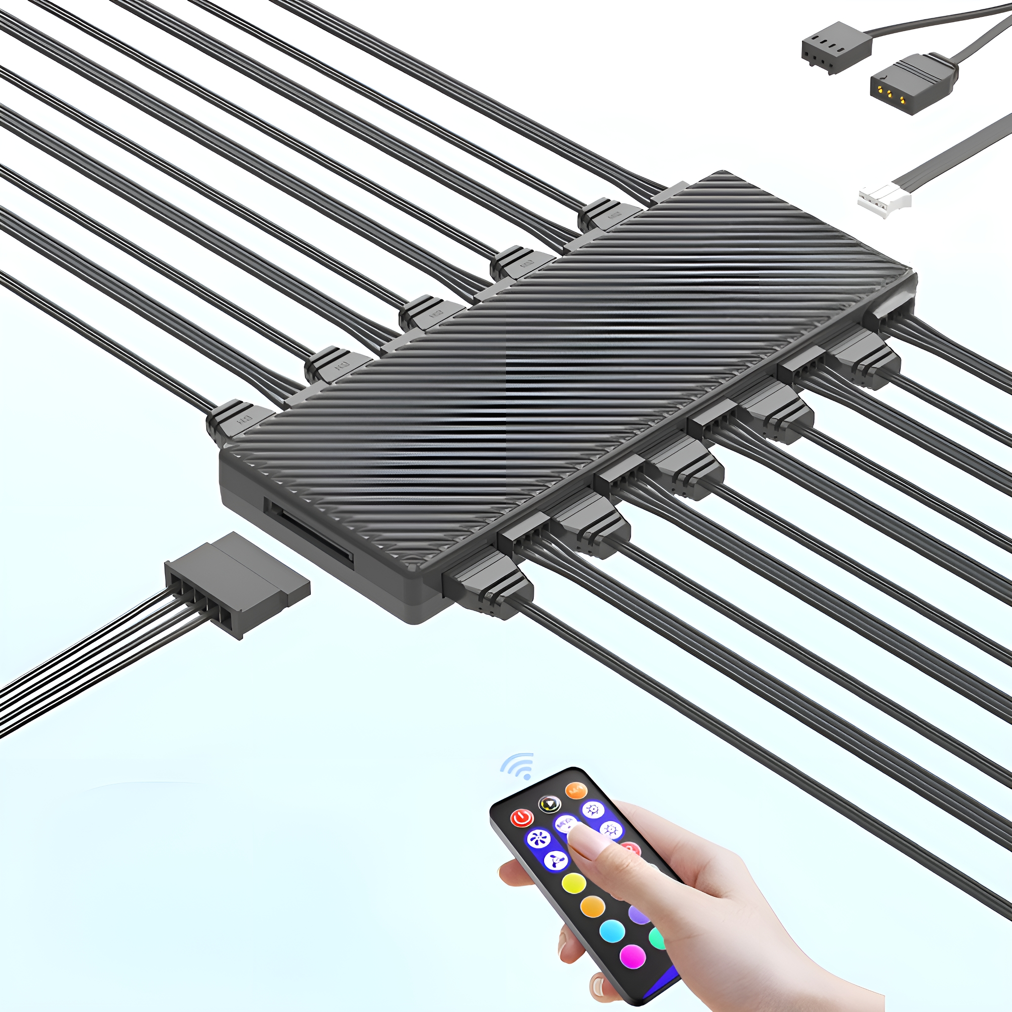 Schwarzer RGB-Controller mit vielen angeschlossenen Kabeln und Fernbedienung.