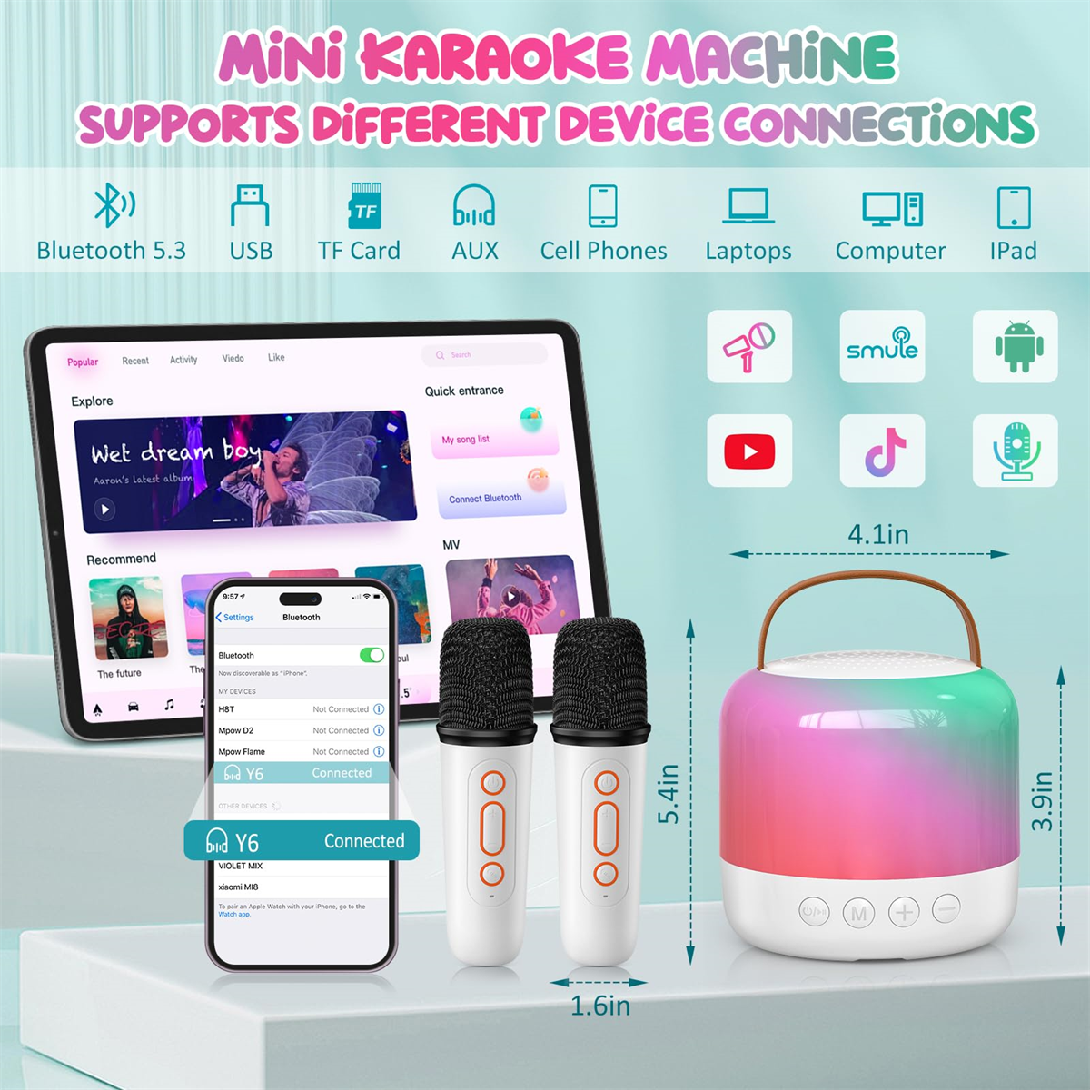Mini-Karaokemaschine mit Mikrofonen und einem Tablet, das eine Karaoke-App und andere Geräte anzeigt.
