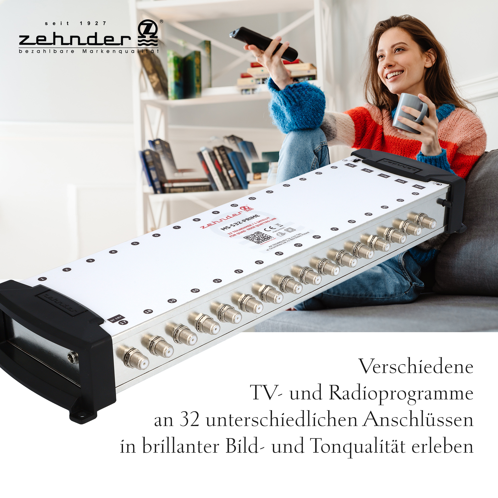 Eine Frau schaut fern, hält einen Becher. Im Vordergrund ein TV-Signalverteiler.