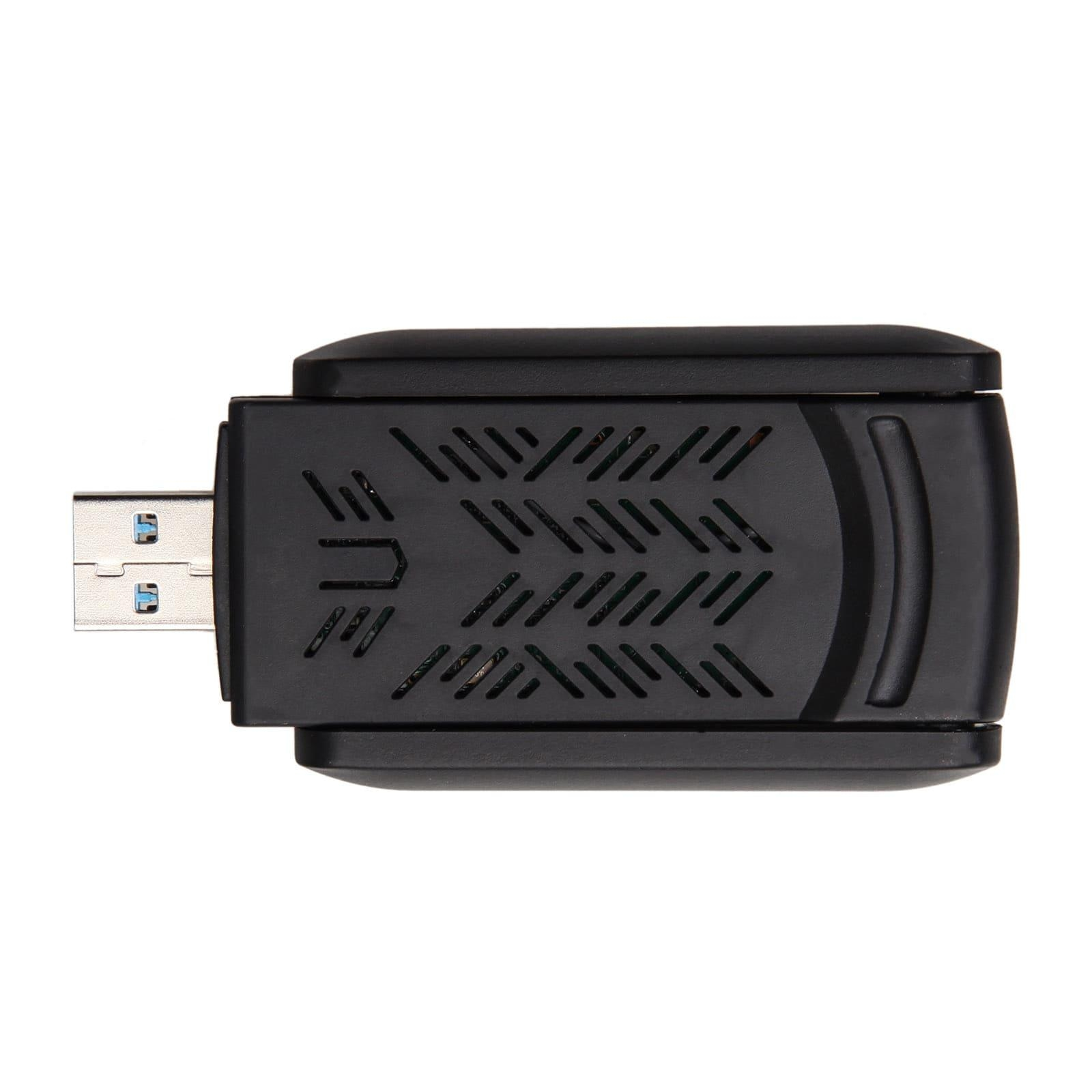 Schwarzer USB-WLAN-Adapter. Er hat eine strukturierte Oberfläche und einen USB-Anschluss.