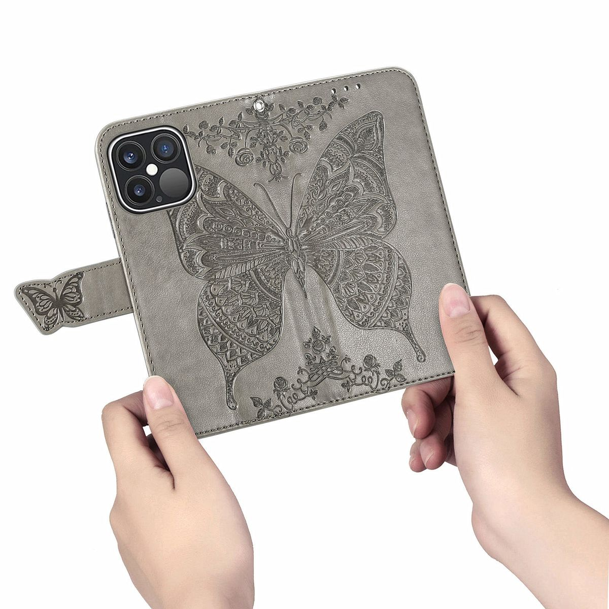 Graue Handyhülle mit Schmetterlingsdesign und floralen Details, gehalten von Händen.