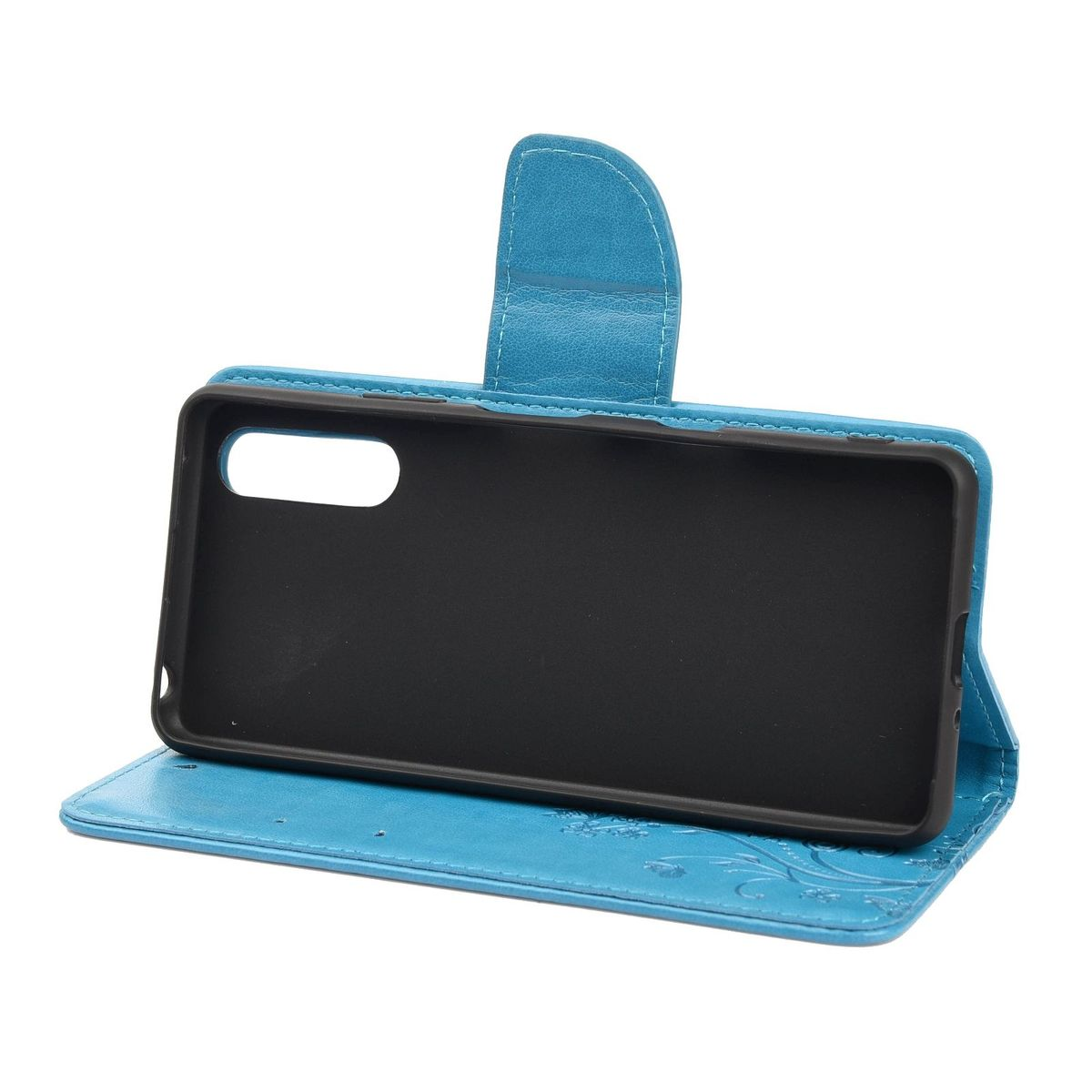 Eine blaue Handyhülle, geöffnet, um das schwarze Innere mit Telefonausschnitt und Blumendesign zu zeigen.