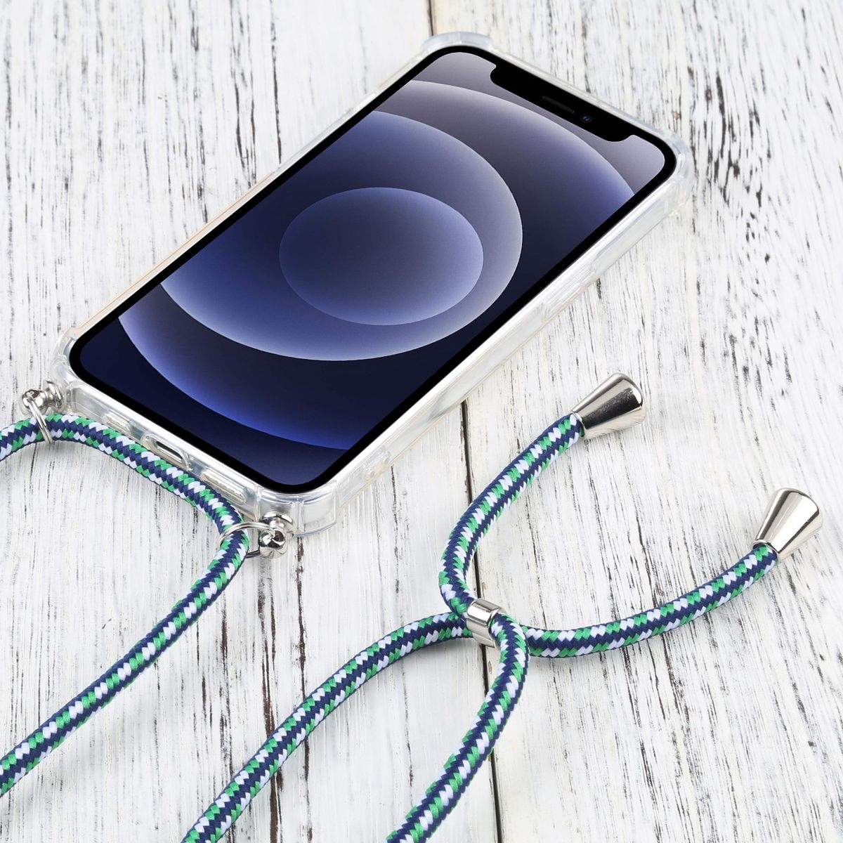 Telefon mit klarer Hülle und Lanyard auf weißer Holzoberfläche.
