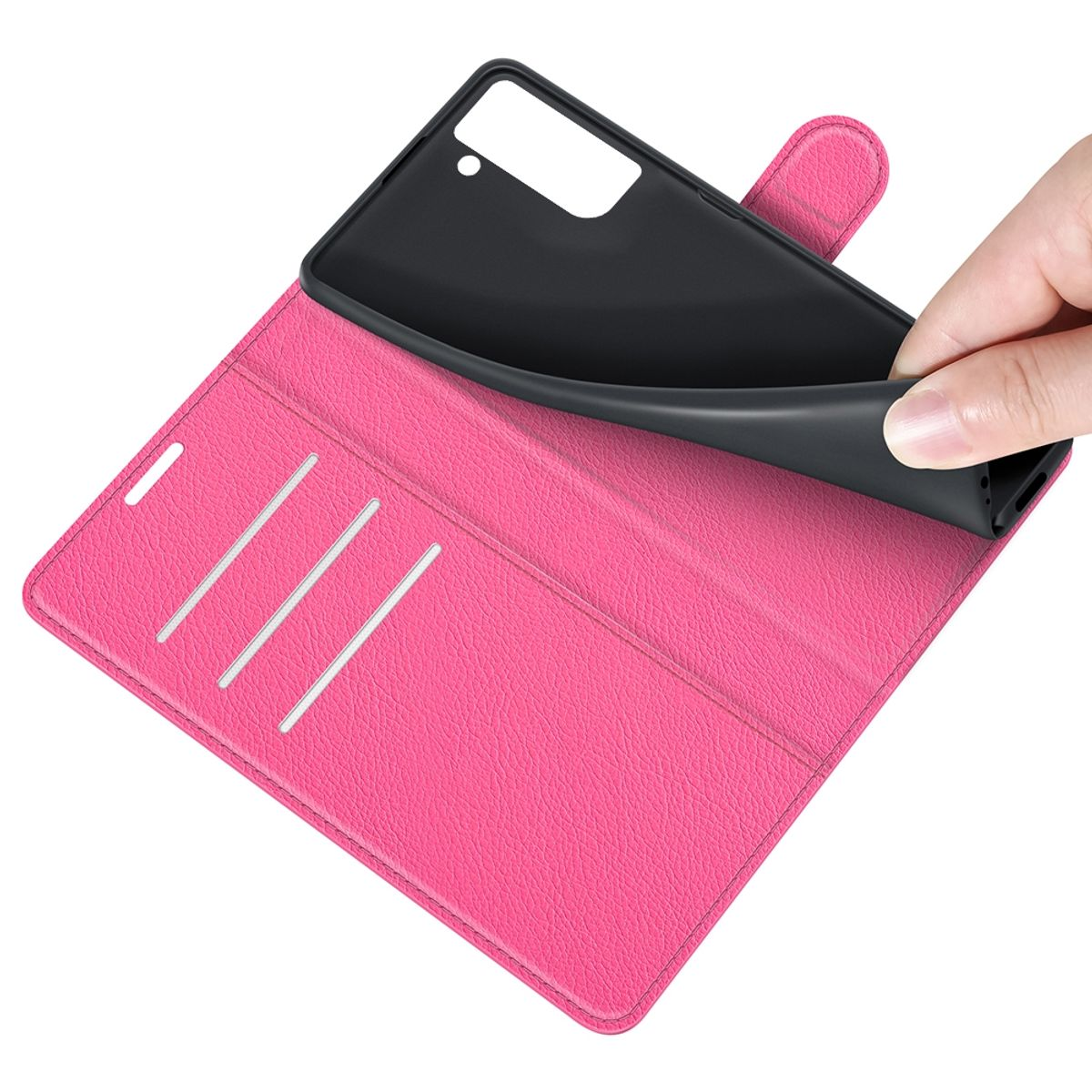 Eine Hand nimmt ein schwarzes Telefon aus einer rosa Handyhülle.