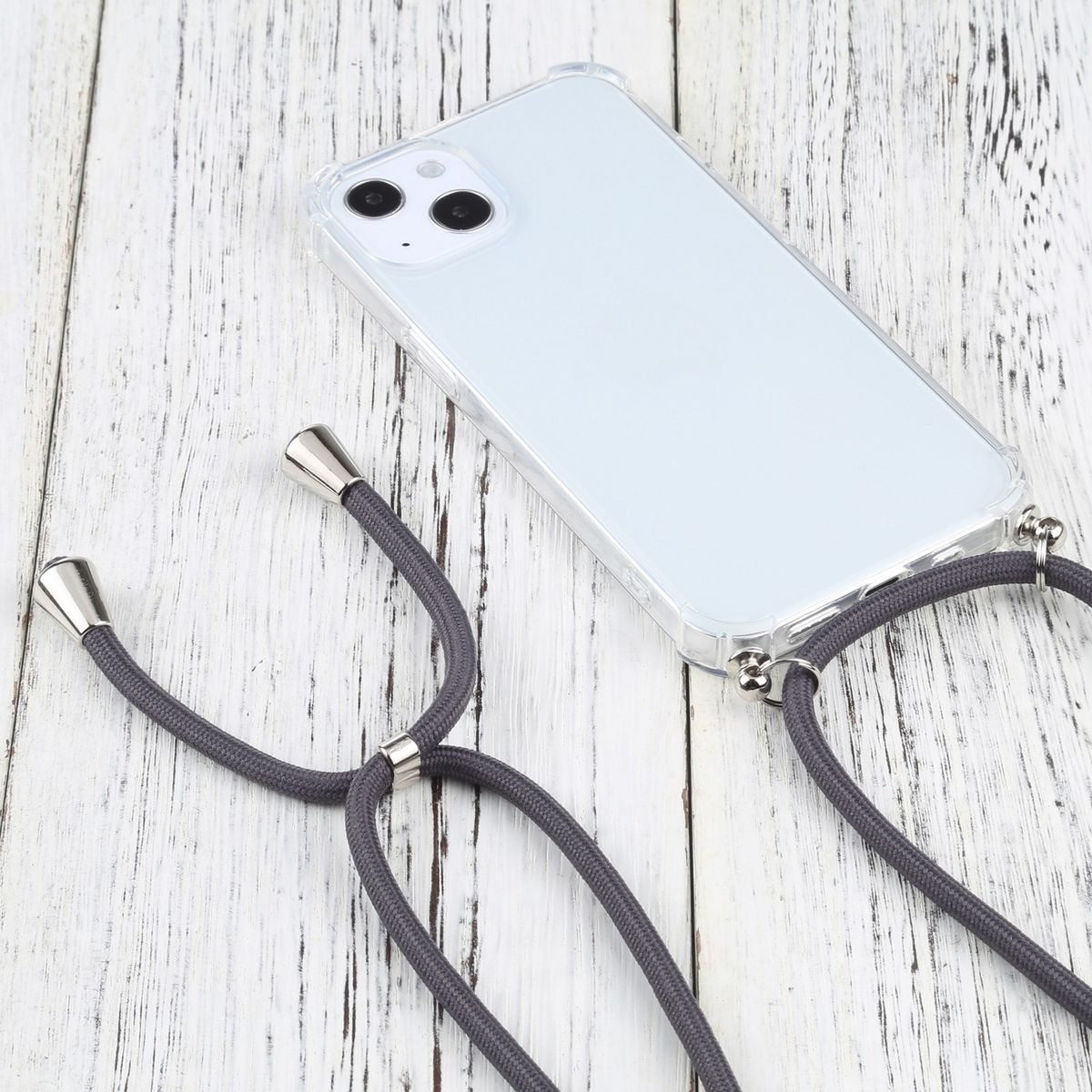 Eine transparente Handyhülle mit einem Telefon darin und einem grauen Riemen mit silbernen Metallakzenten.