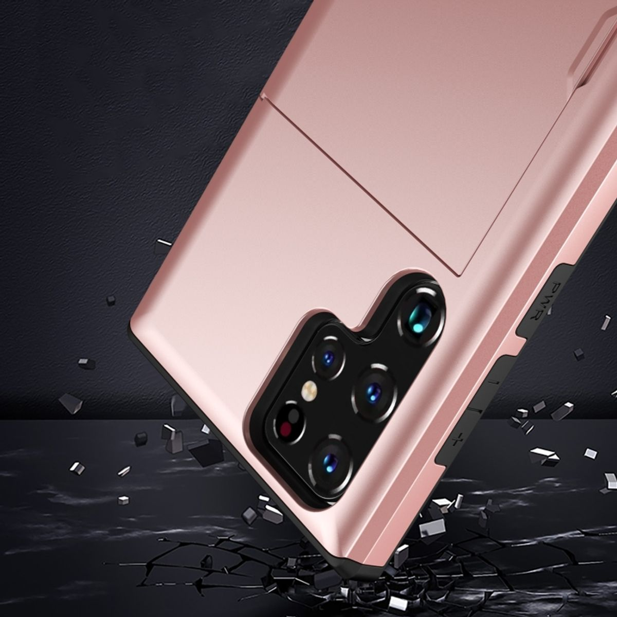 Roségoldfarbene Handyhülle mit Telefon darin, mit dunklem Hintergrund und Stoßeffekt.