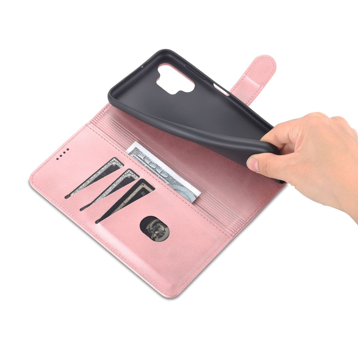 Eine Hand öffnet eine pinkfarbene Handyhülle, um Kartenfächer und Geld freizulegen. Ein Dollarschein ist sichtbar.