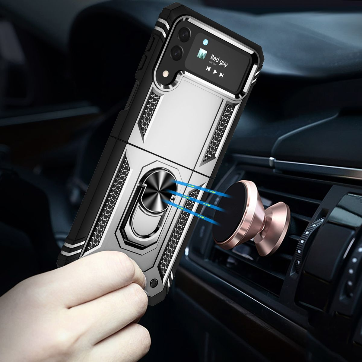 Schwarz-silberne Handyhülle mit Ringhalter. Telefon im Auto, an Magnethalterung befestigt.