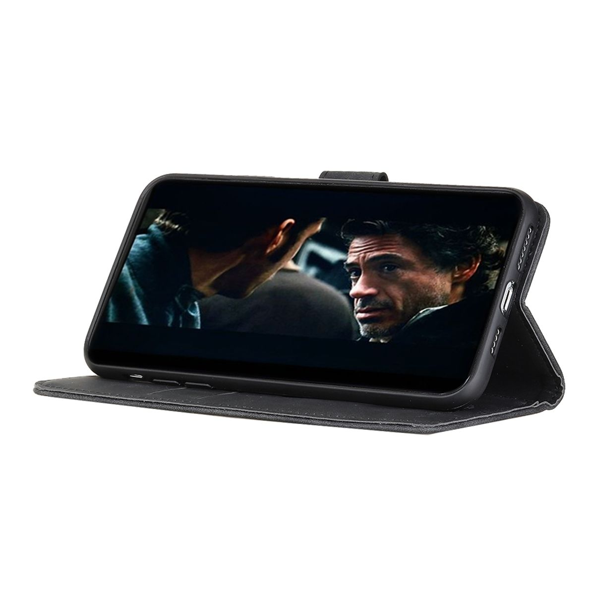 Eine Handyhülle mit einem Telefon, das eine Szene aus einem Film zeigt. Auf einer schwarzen Oberfläche geöffnet.