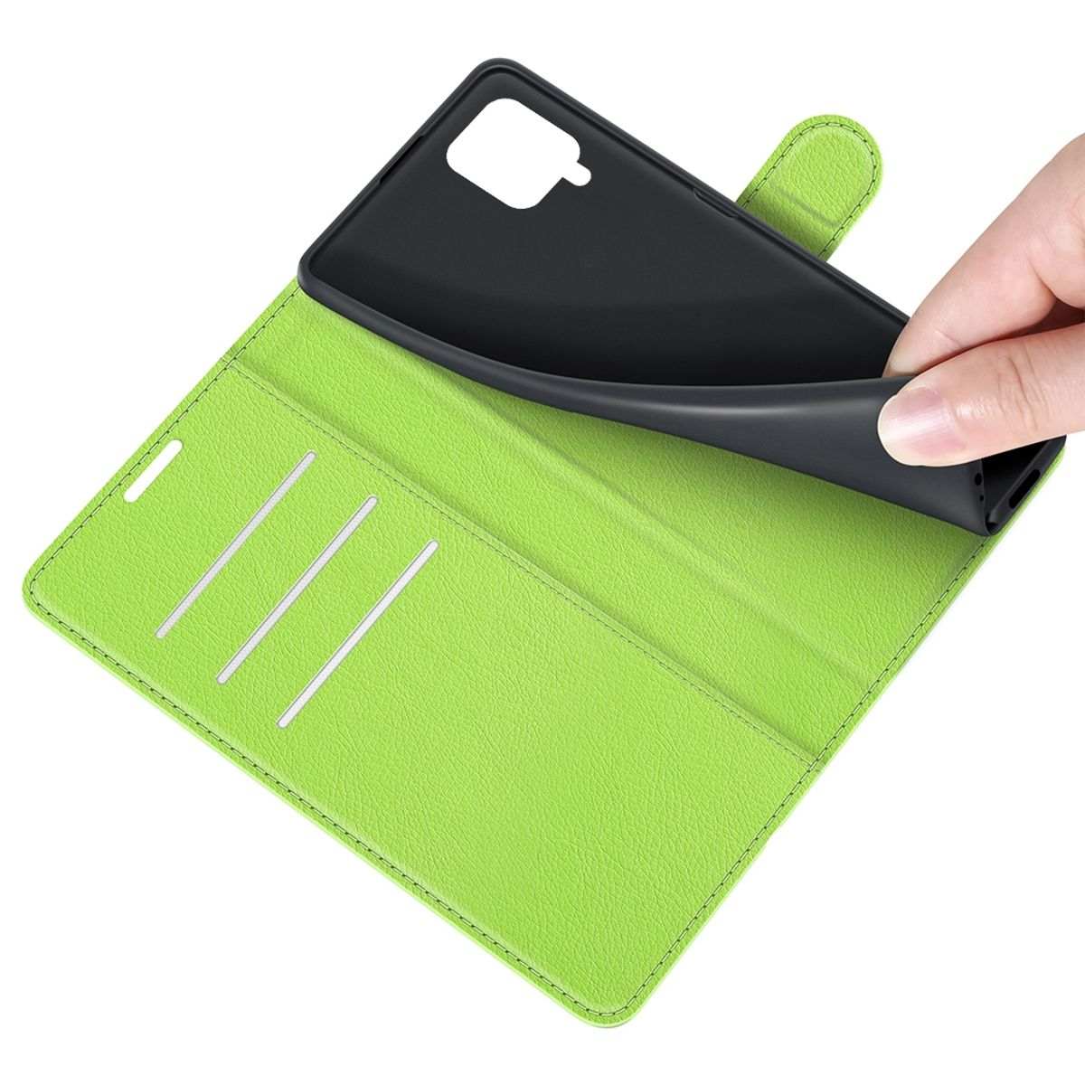 Grüne Handyhülle geöffnet, zeigt eine schwarze Handyhülle im Inneren. Hand, die Handyhülle hält.