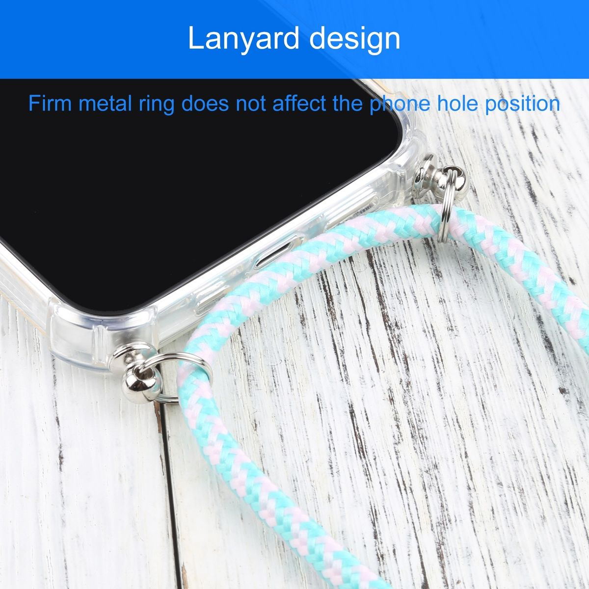 Transparente Handyhülle mit blau-rosa Umhängeband. Der Hintergrund ist Holz.