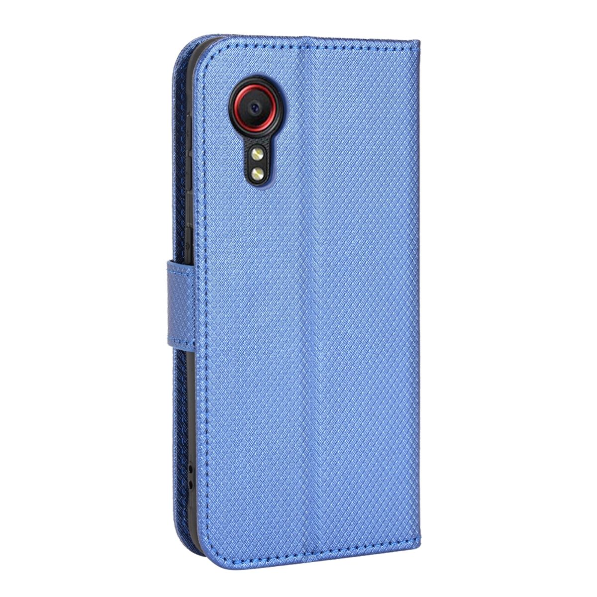 Blaue Handyhülle, offen, mit Telefon. Das Telefon hat eine rote Kamera.
