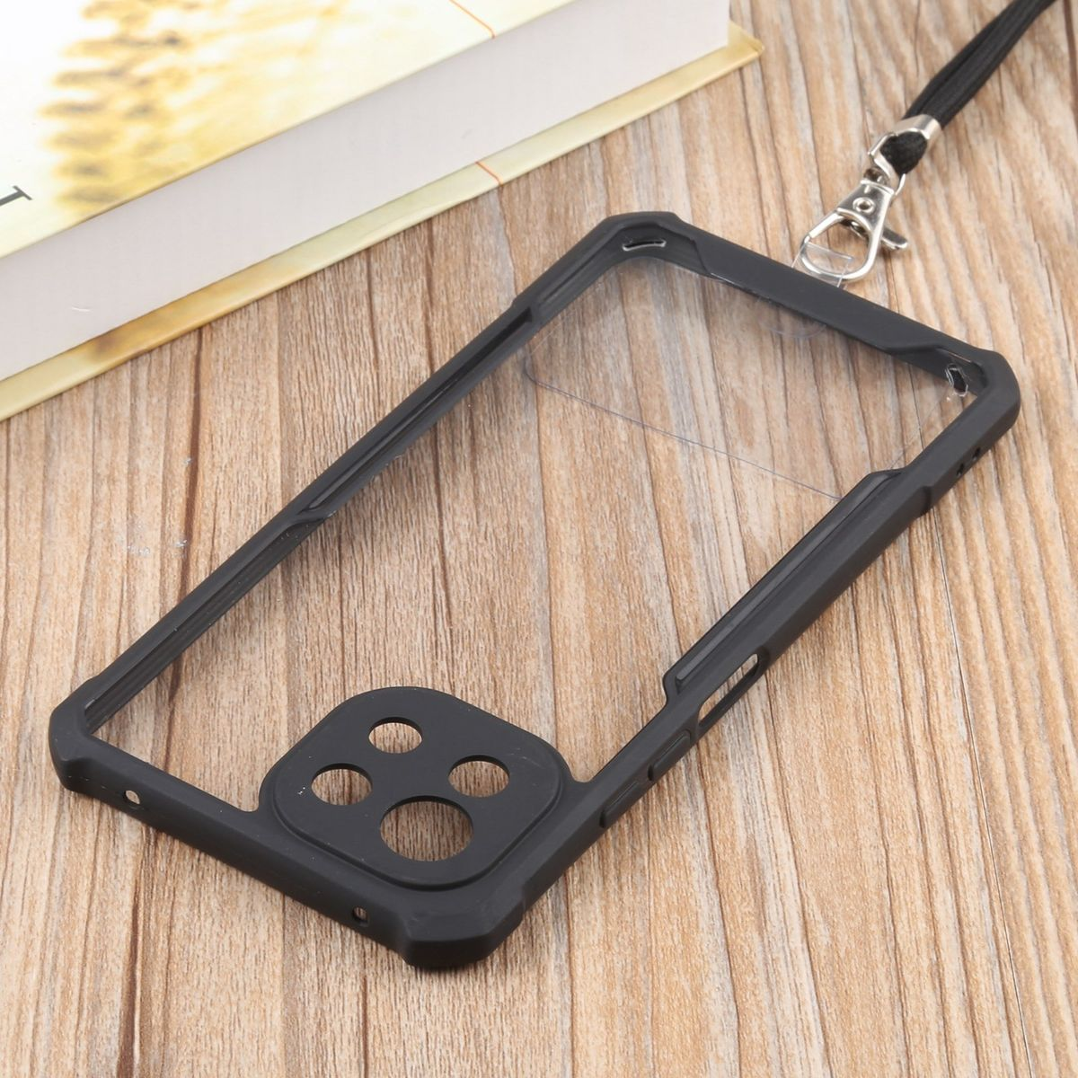 Schwarzer Handycase-Rahmen mit Lanyard, auf Holzoberfläche.