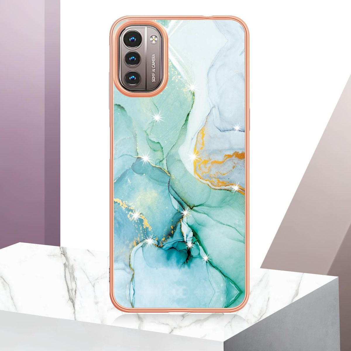 Eine Handyhülle mit Marmordesign. Es ist goldumrandet und hat ein Telefon darin.