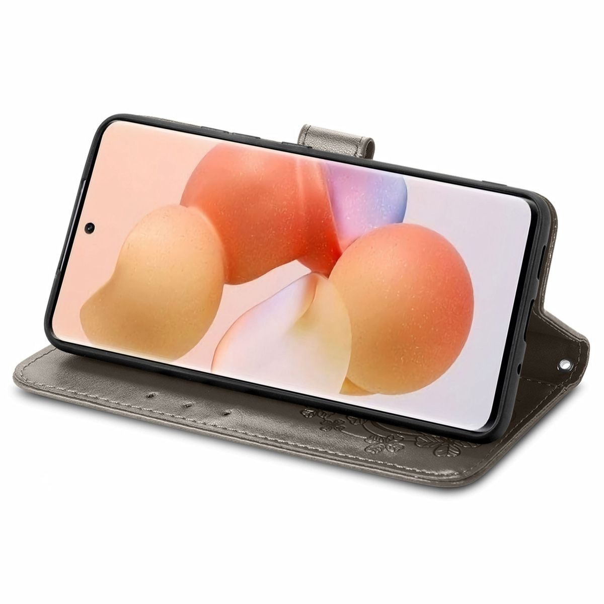 Telefon in grauem Etui, geöffnet, zeigt den Bildschirm. Das Etui liegt auf dunkler Oberfläche.
