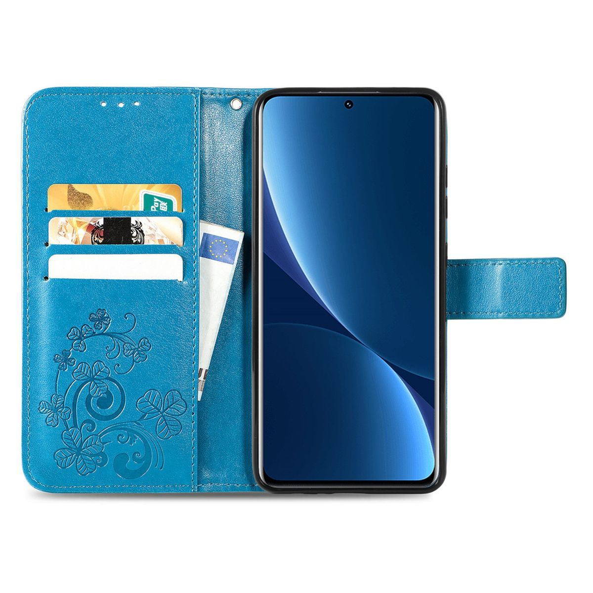 Blaue Handyhülle mit Telefon darin. Die Hülle hat ein Blumendesign, mit Karten und einem Stift darin. Das Telefon ist sichtbar.