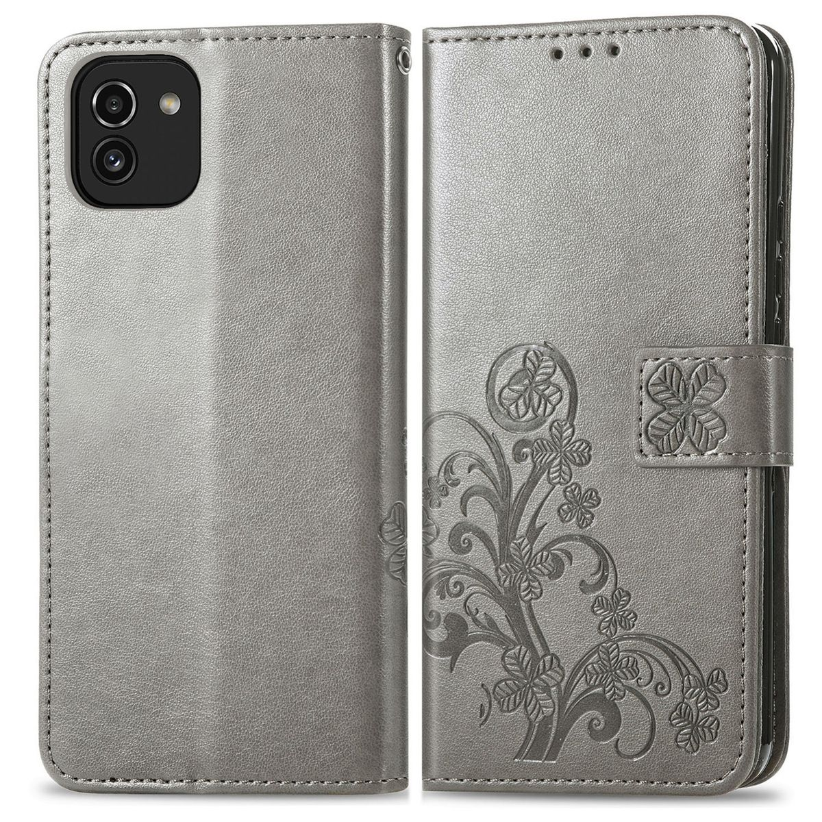 Eine silberne Handyhülle mit floralem Design und einem Telefon darin, offen.