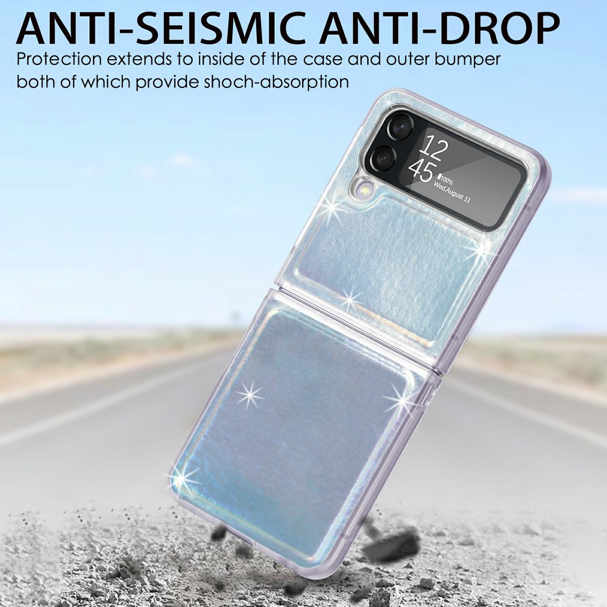 Silberne Handyhülle teilweise geöffnet, mit einem Telefon darin. Der Hintergrund ist eine Asphaltstraße mit Rissen.