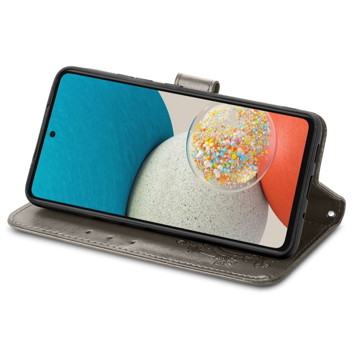 Graue Handyhülle geöffnet mit Telefon. Das Telefon zeigt einen bunten, gepunkteten Hintergrund. Die Hülle ist offen.