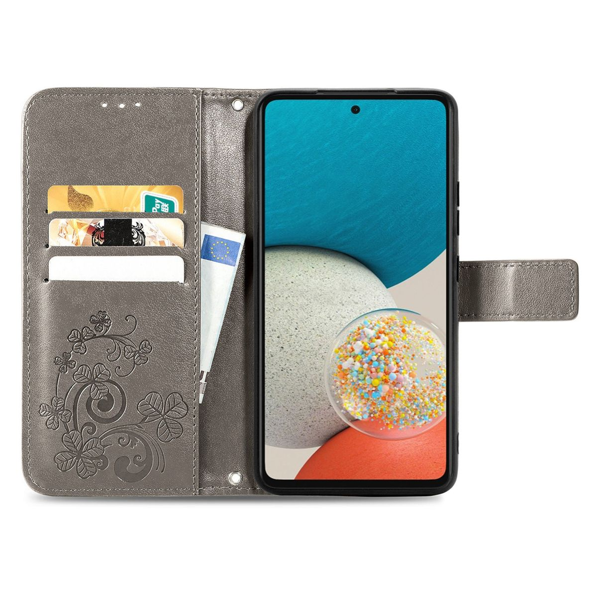 Graue Handyhülle geöffnet, mit Karten und einem Telefon. Der Telefonbildschirm zeigt ein farbenfrohes Design.