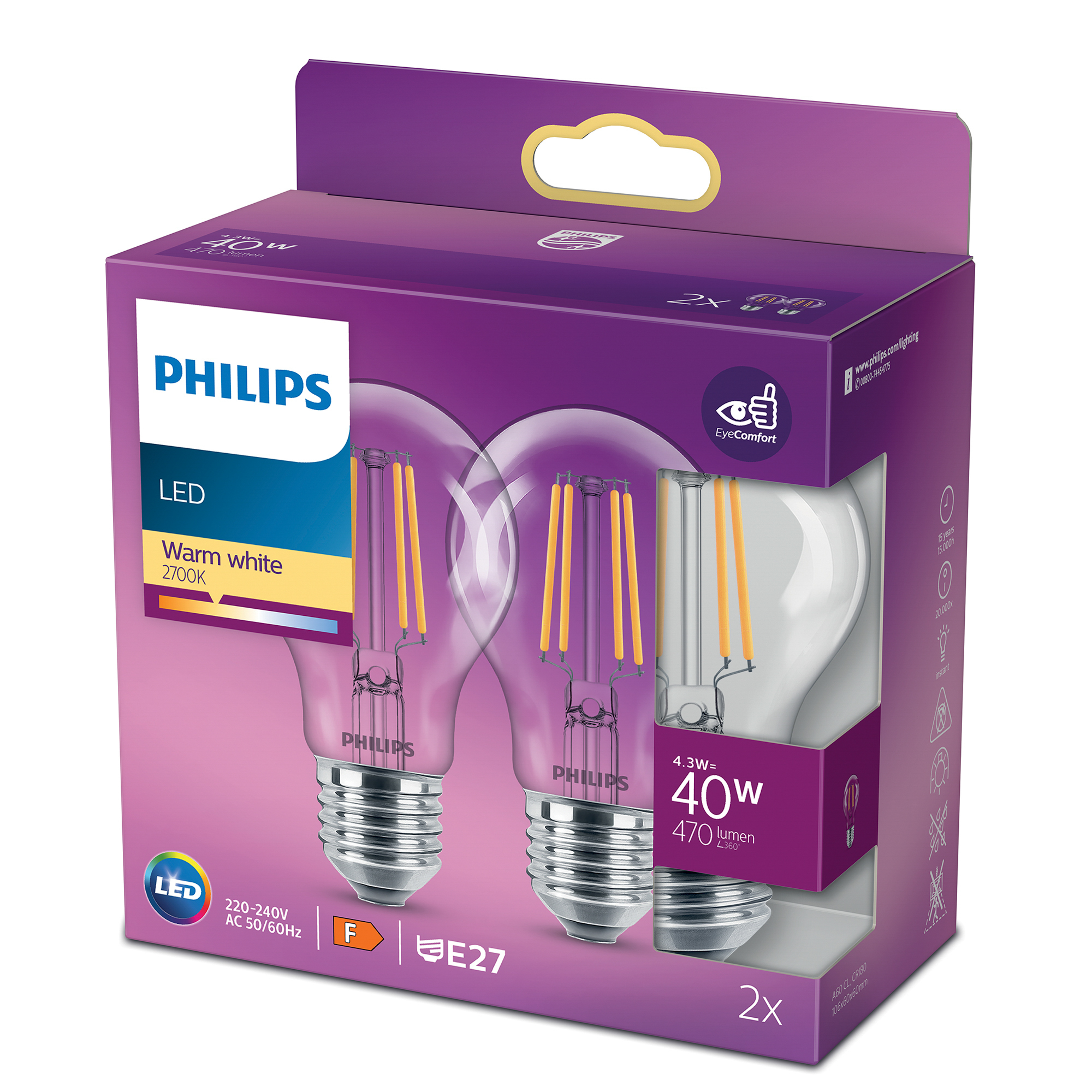 Due lampadine LED in una scatola viola. Le lampadine sono in vetro con filamenti visibili, etichettate con specifiche.