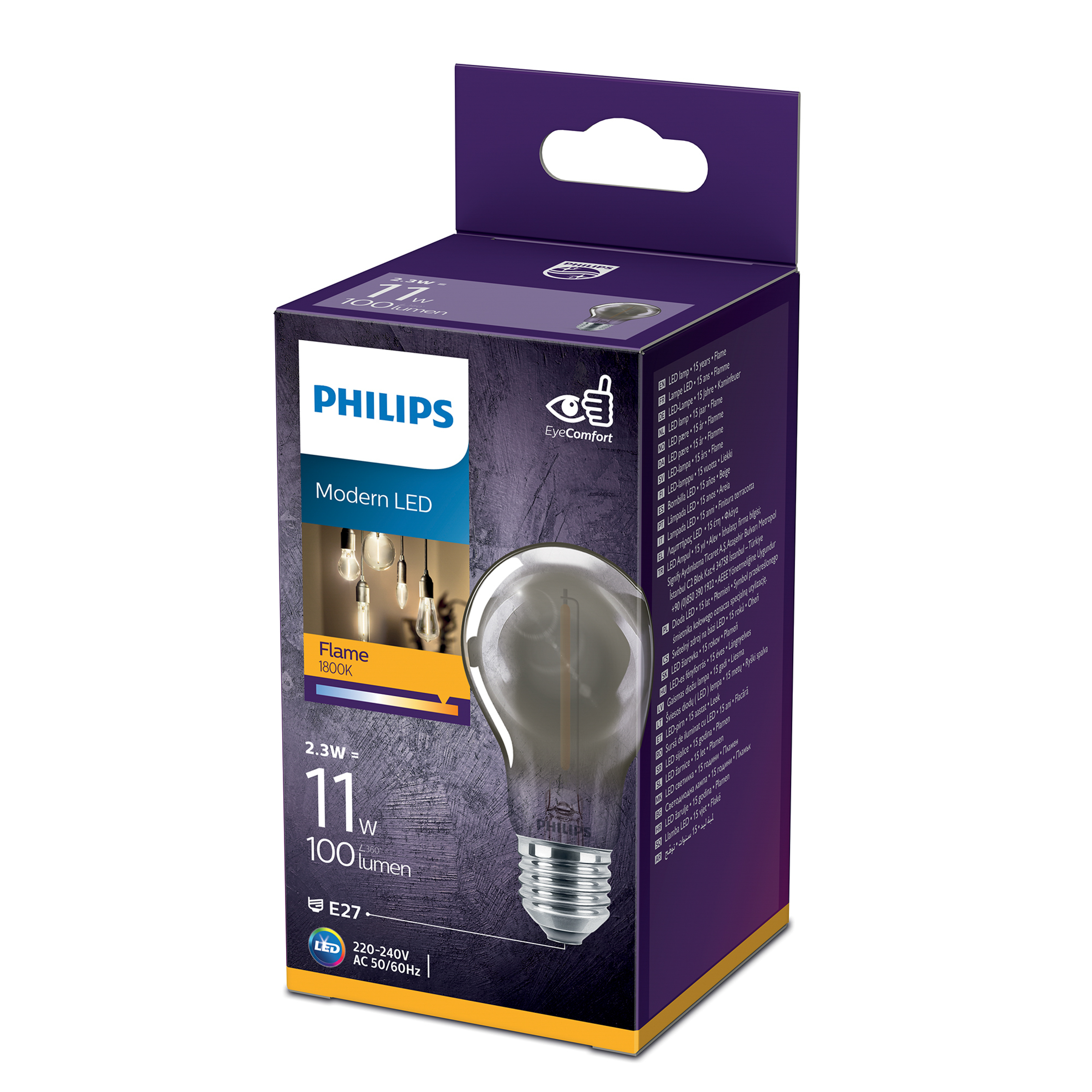 Eine Philips LED-Glühbirne in einer Box. Die Glühbirne ist aus Glas und hat einen Glühfaden. Die Box ist schwarz und lila.