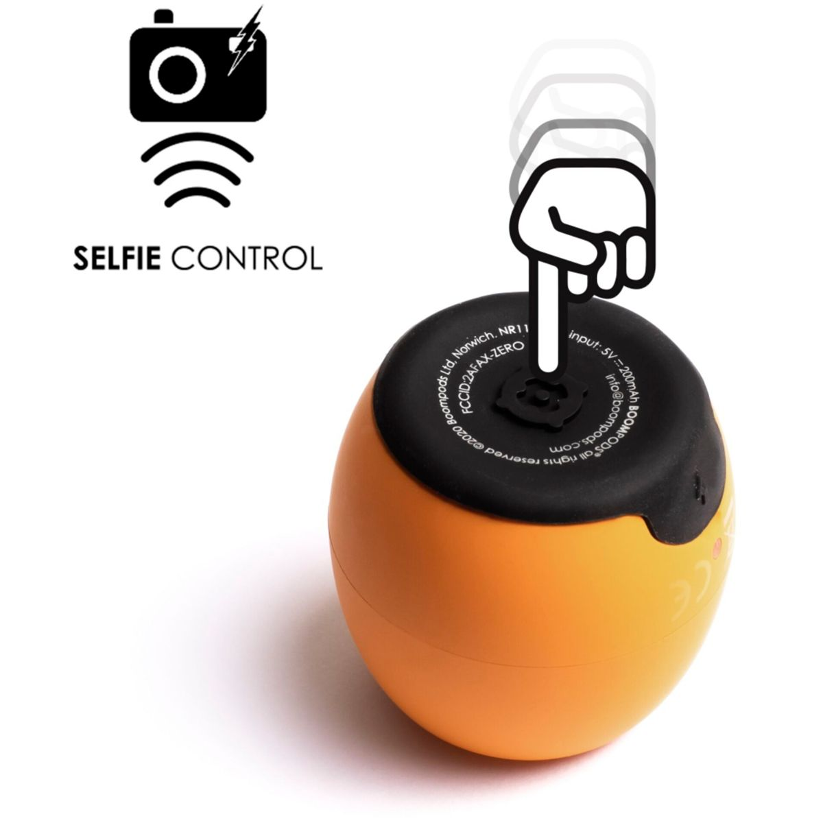 Pomarańczowa piłka z czarną górą, ikona dłoni naciska przycisk. Ikona aparatu u góry.